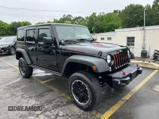 2015 Jeep Wrangler Unlimited Rubicon z VIN 1C4BJWFG2FL541572, wystawiony jako Copart lot #61723875 z przebiegiem 163 169 mil mil oraz Czysty tytuł • Clean title. Historia ofert i sprzedaży dostępna na DreamBid. Obrazek 4.