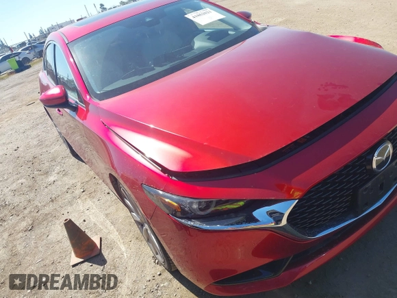 2019 Mazda 3 Premium with VIN JM1BPBEM7K1119186, listed as a IAAI auction lot 41862021 with 39,248 mi miles and . Bid and sale history available at DreamBid. Image 1.