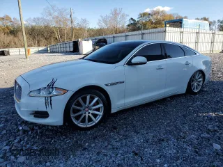 2014 Jaguar XJ with VIN SAJWA1CZ3E8V65747, listed as a Copart auction lot 81718664 with 87,846 mi miles and Clean Title. Bid and sale history available at DreamBid. Image 1.
