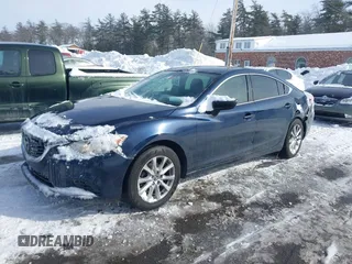 2016 Mazda 6 i Sport with VIN JM1GJ1U53G1407290, listed as a IAAI auction lot 41579668 with 131,527 mi miles and . Bid and sale history available at DreamBid. Image 2.