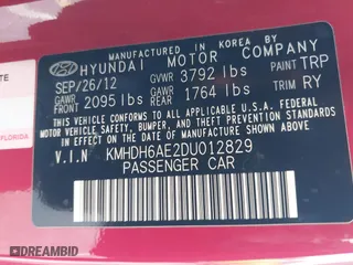 2013 Hyundai Elantra Coupe GS with VIN KMHDH6AE2DU012829, listed as a IAAI auction lot 41503736 with 89,859 mi miles. Bid and sale history available at carsss.com. Image 9.