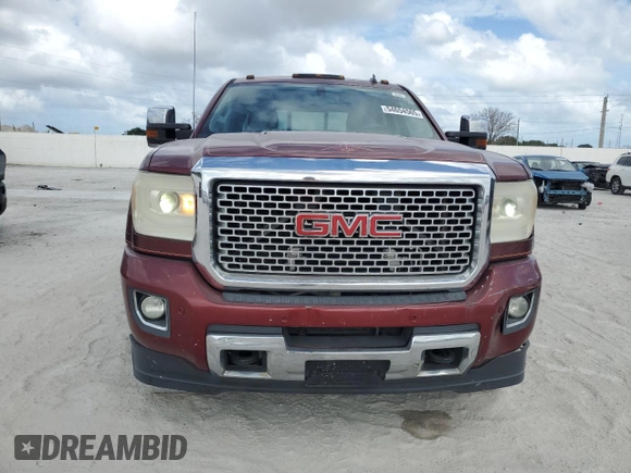 2015 GMC Sierra 2500HD Denali z VIN 1GT120E88FF102231, wystawiony jako Copart lot #54654565 z przebiegiem 305 654 mil mil oraz Czysty tytuł • Clean title. Historia ofert i sprzedaży dostępna na DreamBid. Obrazek 5.