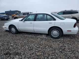 1998 Oldsmobile 88 LS z VIN 1G3HN52K8W4865297, wystawiony jako Copart lot #78698224 z przebiegiem 271 468 mil mil oraz Szkoda całkowita • Salvage title. Historia ofert i sprzedaży dostępna na DreamBid. Obrazek 2.
