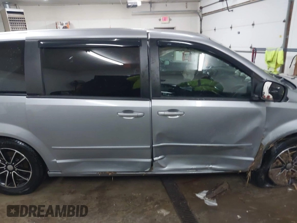 2015 Dodge Grand Caravan SE with VIN 2C4RDGBG9FR703691, listed as a IAAI auction lot 41395564 with 170,735 mi miles and . Bid and sale history available at DreamBid. Image 14.