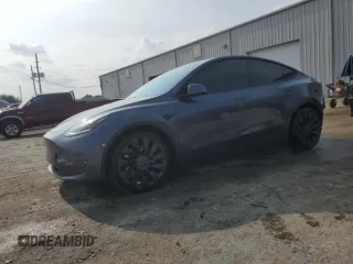2022 Tesla Model Y Performance with VIN 7SAYGDEF4NF447462, listed as a Copart auction lot 58306595 with 61,671 mi miles and Non repairable. Bid and sale history available at DreamBid. Image 1.