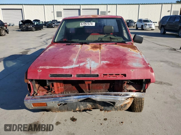 1989 Nissan Hardbody z VIN 1N6ND11S9KC399764, wystawiony jako Copart lot #87067574 z przebiegiem 87 990 mil mil oraz Szkoda całkowita • Salvage title. Historia ofert i sprzedaży dostępna na DreamBid. Obrazek 5.