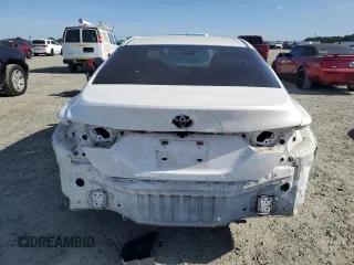 2018 Toyota Camry LE z VIN JTNB11HK2J3001972, wystawiony jako Copart lot #58079565 z przebiegiem 90 841 mil mil oraz Szkoda całkowita • Salvage title. Historia ofert i sprzedaży dostępna na DreamBid. Obrazek 6.