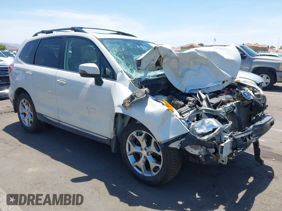 2015 Subaru Forester Touring with VIN JF2SJAWC8FH588321, listed as a IAAI auction lot 42689364 with 103,642 mi miles and . Bid and sale history available at DreamBid. Image 1.