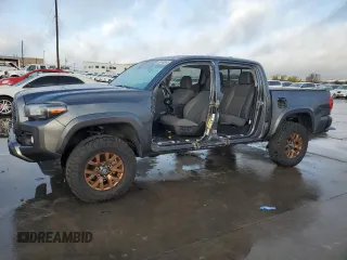 2023 Toyota Tacoma SR with VIN 3TMCZ5AN6PM563491, listed as a Copart auction lot 85149554 with 21,440 mi miles and Salvage title. Bid and sale history available at DreamBid. Image 1.
