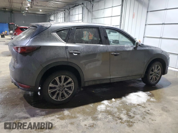2021 Mazda CX-5 Grand Touring with VIN JM3KFADM5M0428282, listed as a Copart auction lot 42567825 with 33,763 mi miles and Salvage Title. Bid and sale history available at carsss.com. Image 3.