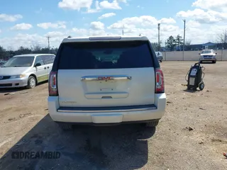 2015 GMC Yukon Denali with VIN 1GKS1CKJ5FR285199, listed as a IAAI auction lot 41763187 with 135,265 mi miles. Bid and sale history available at carsss.com. Image 16.
