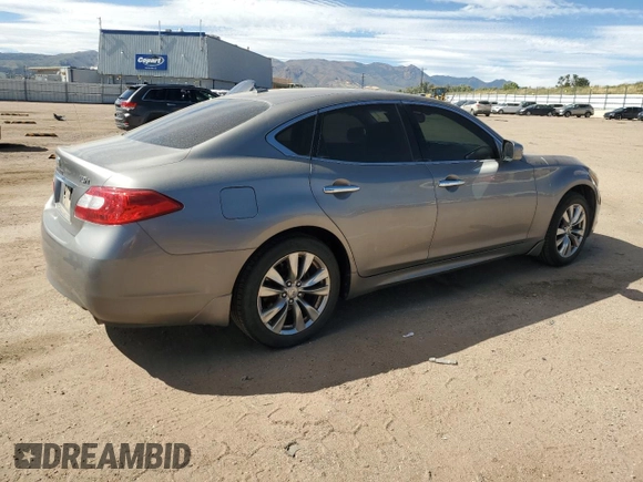 2012 Infiniti M37 with VIN JN1BY1AR1CM390255, listed as a Copart auction lot 72612194 with 151,860 mi miles and Salvage Title. Bid and sale history available at carsss.com. Image 3.