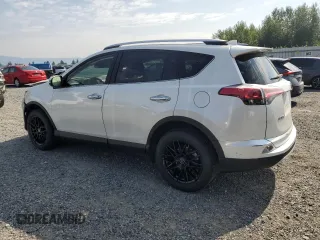 2016 Toyota RAV4 Limited with VIN JTMDFREV9GJ066429, listed as a Copart auction lot 61874995 with 77,686 mi miles and Salvage title. Bid and sale history available at DreamBid. Image 2.