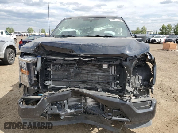 2023 Ford F-150 z VIN 1FTFW1P85PKF48519, wystawiony jako Copart lot #55944545 z przebiegiem 26 971 mil mil oraz Szkoda całkowita • Salvage title. Historia ofert i sprzedaży dostępna na DreamBid. Obrazek 5.