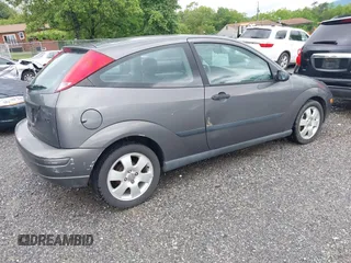 2002 Ford Focus ZX3 with VIN 3FAFP31322R232138, listed as a IAAI auction lot 42253174 with 178,405 mi miles and . Bid and sale history available at DreamBid. Image 4.