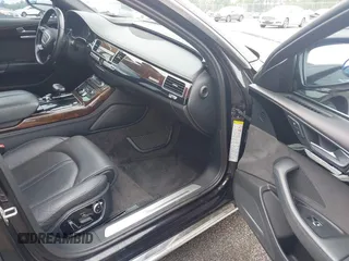 2015 Audi A8 4.0T z VIN WAU32AFD9FN023826, wystawiony jako IAAI lot #42353372 z przebiegiem 94 833 mil mil oraz . Historia ofert i sprzedaży dostępna na DreamBid. Obrazek 5.