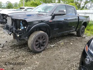 2022 Ram 2500 Laramie with VIN 3C6UR5FJ9NG254692, listed as a Copart auction lot 57140095 with 24,303 mi miles and Salvage title. Bid and sale history available at DreamBid. Image 1.