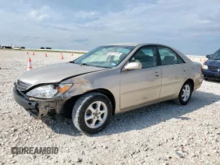 2004 Toyota Camry LE with VIN 4T1BE32K14U329066, listed as a Copart auction lot 60711515 with 178,144 mi miles and Salvage title. Bid and sale history available at DreamBid. Image 1.