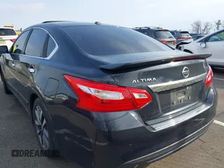 2016 Nissan Altima SR with VIN 1N4AL3AP3GC292783, listed as a IAAI auction lot 41876267 with 128,013 mi miles and . Bid and sale history available at carsss.com. Image 3.