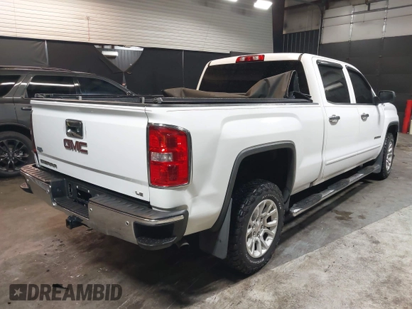 2018 GMC Sierra 1500 SLE z VIN 3GTU2MEC5JG104843, wystawiony jako IAAI lot #42447744 z przebiegiem 136 874 mil mil oraz . Historia ofert i sprzedaży dostępna na DreamBid. Obrazek 4.