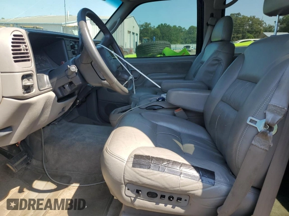 1999 GMC Suburban z VIN 3GKFK16R2XG544767, wystawiony jako Copart lot #67078414 z przebiegiem 154 145 mil mil oraz Szkoda całkowita • Salvage title. Historia ofert i sprzedaży dostępna na DreamBid. Obrazek 7.