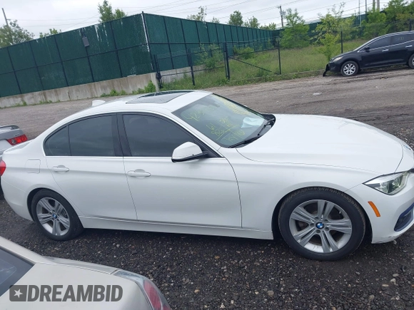 2018 BMW 3 Series 330i xDrive with VIN WBA8D9C52JEM32318, listed as a IAAI auction lot 42309352 with 61,828 mi miles and . Bid and sale history available at DreamBid. Image 13.
