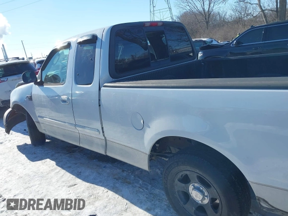2003 Ford F-150 XL with VIN 2FTRX17W13CA94356, listed as a IAAI auction lot 41346444 with 180,686 mi miles and . Bid and sale history available at DreamBid. Image 14.