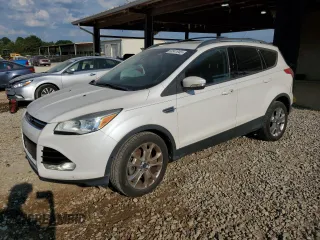 2013 Ford Escape SEL z VIN 1FMCU9H99DUA02767, wystawiony jako Copart lot #63341945 z przebiegiem 130 245 mil mil oraz Czysty tytuł • Clean title. Historia ofert i sprzedaży dostępna na DreamBid. Obrazek 1.