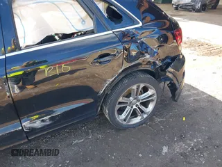 2015 Audi Q3 Premium Plus z VIN WA1EFCFS4FR001441, wystawiony jako IAAI lot #41813239 z przebiegiem 112 795 mil mil oraz . Historia ofert i sprzedaży dostępna na DreamBid. Obrazek 6.