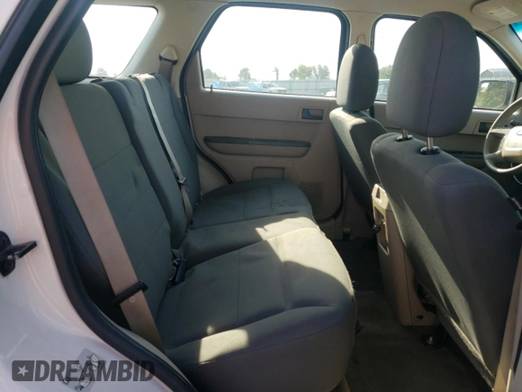 2010 Ford Escape XLS with VIN 1FMCU0C76AKB82752, listed as a Copart auction lot 57626565 with 194,931 mi miles and Salvage title. Bid and sale history available at DreamBid. Image 11.