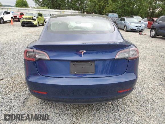 2023 Tesla Model 3 with VIN 5YJ3E1EA7PF450973, listed as a Copart auction lot 61082175 with 47,029 mi miles and Salvage title. Bid and sale history available at DreamBid. Image 6.