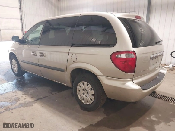 2006 Chrysler Town & Country SWB with VIN 1A4GP45R06B745699, listed as a IAAI auction lot 39490821 with 116,876 mi miles. Bid and sale history available at carsss.com. Image 3.
