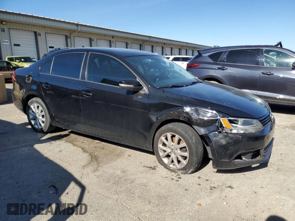 2011 Volkswagen Jetta SE with VIN 3VWDX7AJ2BM013018, listed as a Copart auction lot 73686974 with 145,557 mi miles and Salvage title. Bid and sale history available at DreamBid. Image 4.