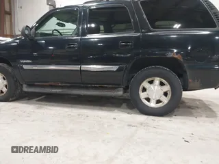 2005 GMC Yukon SLT with VIN 1GKEK13T15J143363, listed as a IAAI auction lot 41996424 with 272,819 mi miles. Bid and sale history available at carsss.com. Image 6.