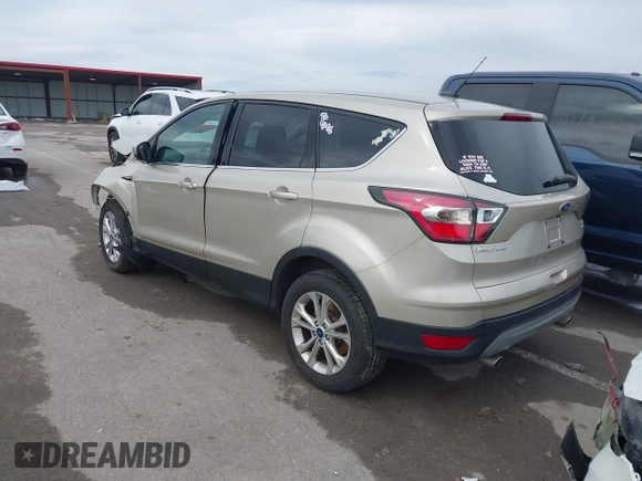 2017 Ford Escape SE with VIN 1FMCU9GD1HUB28732, listed as a IAAI auction lot 41546177 with 126,698 mi miles and . Bid and sale history available at DreamBid. Image 3.