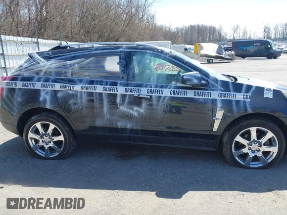 2011 Cadillac SRX Performance Collection with VIN 3GYFNEEY3BS560107, listed as a IAAI auction lot 42017220 with 243,740 mi miles and . Bid and sale history available at carsss.com. Image 13.