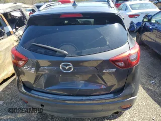 2016 Mazda CX-5 Grand Touring with VIN JM3KE4DY8G0616421, listed as a Copart auction lot 50884525 with 182,048 mi miles and Salvage Title. Bid and sale history available at DreamBid. Image 6.