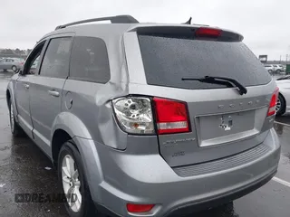 2016 Dodge Journey SXT with VIN 3C4PDDBG7GT173158, listed as a IAAI auction lot 42020182 with 159,136 mi miles. Bid and sale history available at carsss.com. Image 3.