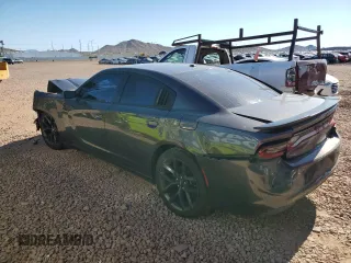 2020 Dodge Charger SXT with VIN 2C3CDXBG0LH101290, listed as a Copart auction lot 56560135 with 95,955 mi miles and Salvage title. Bid and sale history available at DreamBid. Image 2.