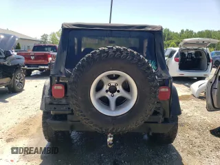 1997 Jeep Wrangler SE with VIN 1J4FY29P2VP431639, listed as a Copart auction lot 61222754 with 225,081 mi miles and Salvage Title. Bid and sale history available at carsss.com. Image 6.