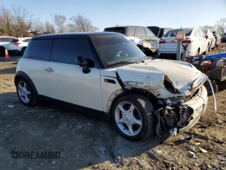 2004 MINI Hardtop with VIN WMWRC334X4TJ54215, listed as a Copart auction lot 46860695 with Not Provided miles and Salvage Title. Bid and sale history available at DreamBid. Image 4.