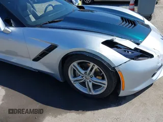 2017 Chevrolet Corvette 1LT z VIN 1G1YA2D71H5103681, wystawiony jako IAAI lot #42302548 z przebiegiem 69 557 mil mil oraz . Historia ofert i sprzedaży dostępna na DreamBid. Obrazek 6.