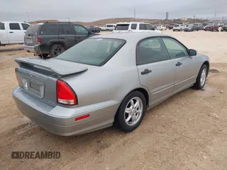 2002 Mitsubishi Diamante z VIN 6MMAP87P82T022689, wystawiony jako IAAI lot #41193483 z przebiegiem 107 022 mil mil oraz . Historia ofert i sprzedaży dostępna na DreamBid. Obrazek 4.