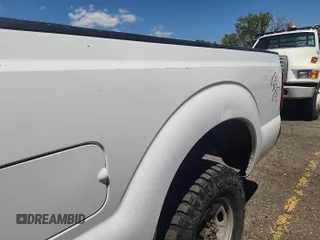 2014 Ford F-250 XL with VIN 1FT7X2B61EEB37353, listed as a IAAI auction lot 42631382 with 123,533 mi miles and . Bid and sale history available at DreamBid. Image 1.