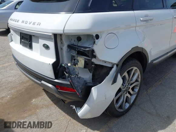 2015 Land Rover Range Rover Evoque Prestige with VIN SALVV2BG4FH076675, listed as a IAAI auction lot 42138353 with 99,751 mi miles and . Bid and sale history available at DreamBid. Image 6.