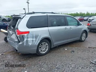 2012 Toyota Sienna XLE AAS with VIN 5TDYK3DC2CS205856, listed as a IAAI auction lot 42230009 with 136,588 mi miles and . Bid and sale history available at DreamBid. Image 4.