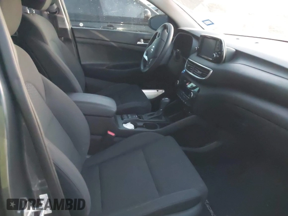 2019 Hyundai Tucson Sport with VIN KM8J33AL7KU901296, listed as a IAAI auction lot 41132884 with 76,948 mi miles. Bid and sale history available at carsss.com. Image 5.