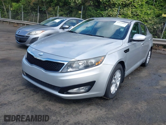 2013 Kia Optima LX z VIN 5XXGM4A72DG177062, wystawiony jako IAAI lot #42129883 z przebiegiem 144 097 mil mil oraz . Historia ofert i sprzedaży dostępna na DreamBid. Obrazek 17.