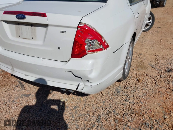 2012 Ford Fusion SE with VIN 3FAHP0HAXCR427773, listed as a IAAI auction lot 41640675 with 166,234 mi miles and . Bid and sale history available at carsss.com. Image 6.