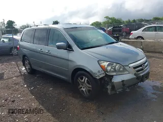 2007 Honda Odyssey EX-L z VIN 5FNRL38717B002725, wystawiony jako IAAI lot #42177209 z przebiegiem 226 706 mil mil oraz . Historia ofert i sprzedaży dostępna na DreamBid. Obrazek 1.